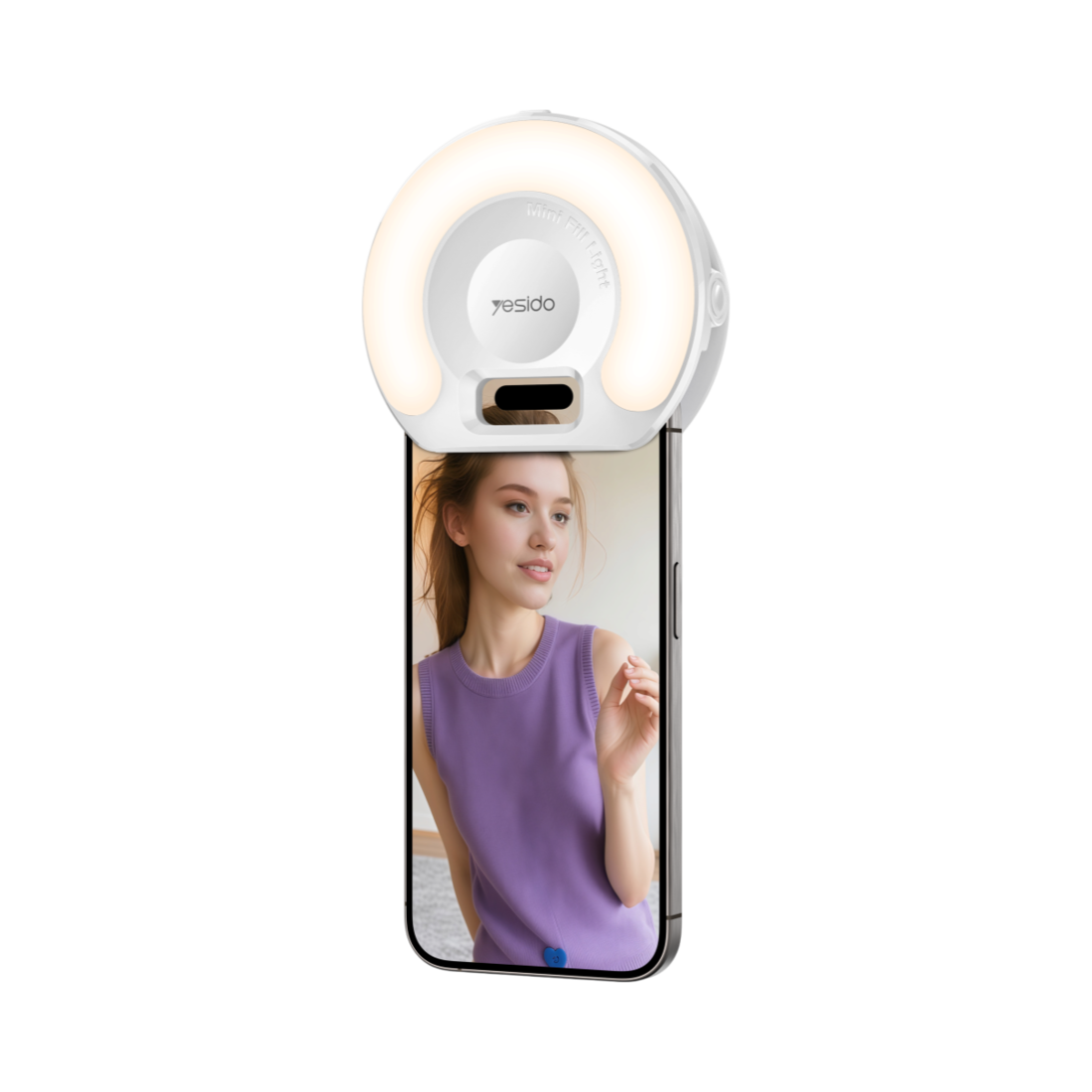 GlowClip LED selfie light Yesido – vit ringlampa med klämma på mobil Vit LED-ringlampa GlowClip från Yesido fastklämd på en mobil som lyser upp ansiktet